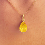 GOLDEN LIGHT – Yellow Sapphire & Diamond Pendant in 18 kt Gold