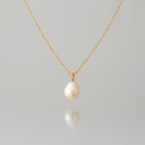 Luminous Pearl Charm · Natural Freshwater Pearl & 14k Gold Bail