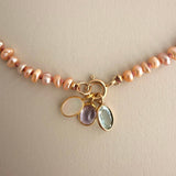 ETHIOPIAN OPAL – charm – 18 k gold